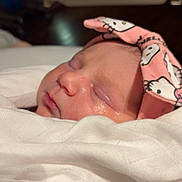 Elaine joined the competition — help win amazing prizes! adorable, baby, blanket, cartoon, child, closeup, cozy, cute, face, headband, indoor, infant, newborn, peaceful, person, pink, resting, sleeping, soft, wrapped