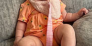 Aubree joined the competition — help win amazing prizes! baby, sleeping, pacifier, headband, orange_clothing, pineapple_pattern, bib, couch, soft_furniture, infant, chubby_legs, relaxed, indoors, comfort, cute, peaceful, child, toddler, resting, adorable