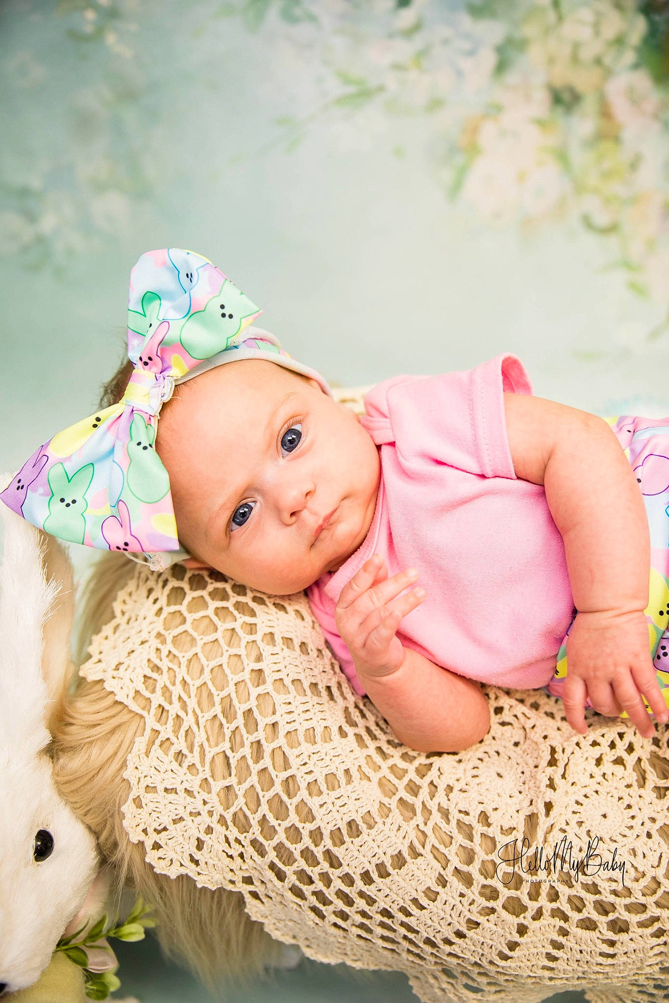 Sarah is registered to the contest to win money with this photo: baby, baby_toddler_clothing, cap, cheek, child, doll, dress, fashion_accessory, grass, happy, hat, headgear, headwear, knit_cap, linens, pattern, people_in_nature, person, pink, skin