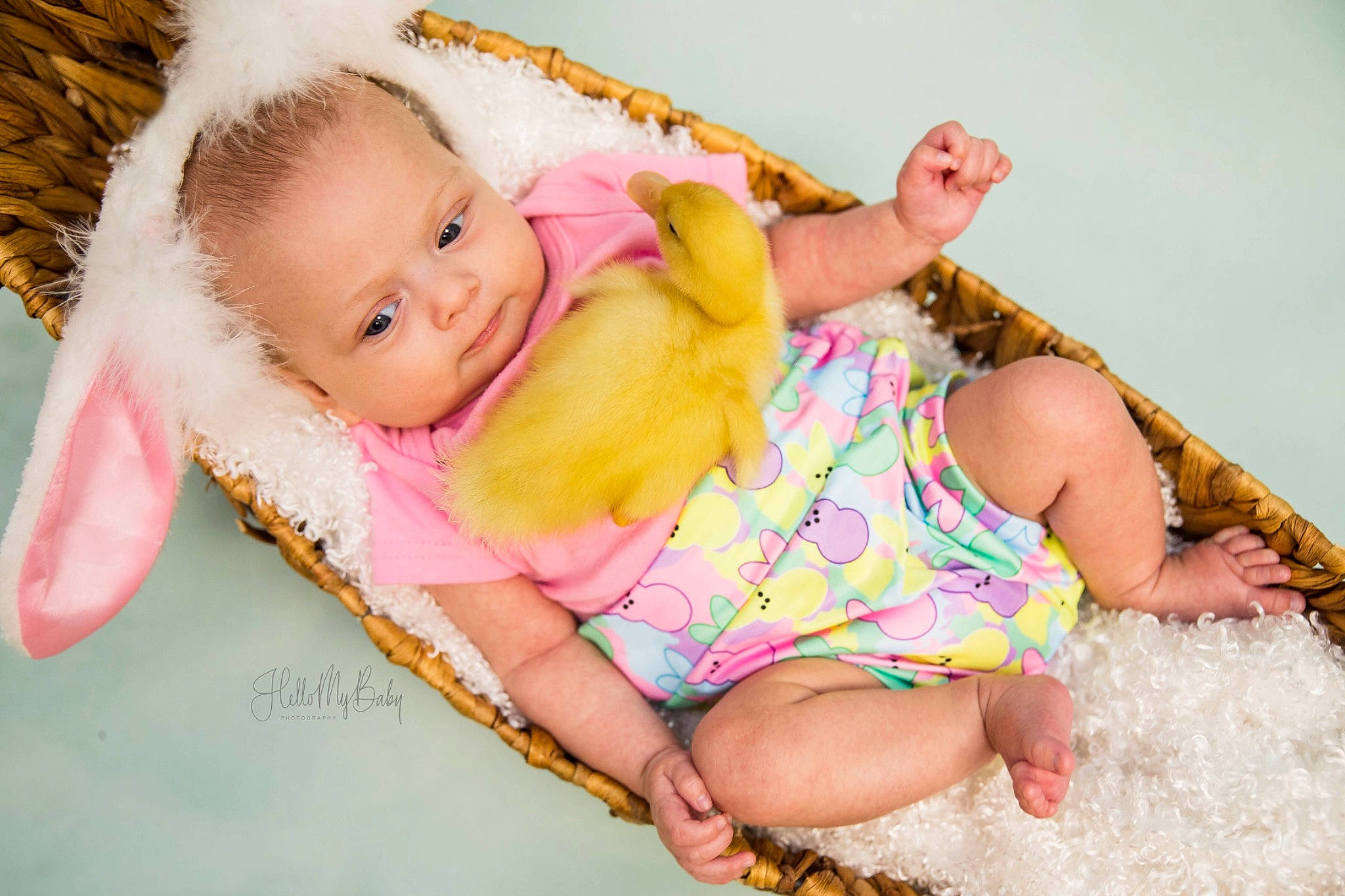 Sarah is registered to the contest to win money with this photo: arm, baby, baby_toddler_clothing, barefoot, child, comfort, facial_expression, finger, foot, fun, hand, happy, human_body, leisure, person, pink, sitting, skin, sock, thigh
