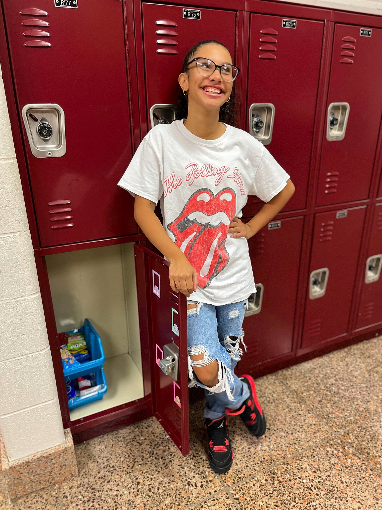 Julie joined the competition — help win amazing prizes! automotive_exterior, boot, electric_blue, fashion_design, fun, gas, joint, joy, locker, machine, motor_vehicle, person, red, room, shoe, shorts, sleeve, smile, sneakers, sportswear