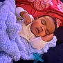Zaedyn is registered to the contest to win money with this photo: baby, sleeping, blanket, pacifier, infant, cozy, child, cute, resting, soft, warm, face, hand, indoors, bedtime, peaceful, toddler, comfort, clothing, head