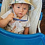 Loukas participe au concours pour gagner de l'argent avec cette photo : animal_print, baby, bucket_hat, child, clothing, curious_expression, cute, face, furniture, hand, high_chair, indoor, person, plastic_tray, portrait, seat, shirt, sunglasses, toddler, young_child