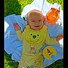 Connor joined the competition — help win amazing prizes! baby, blanket, bottle, child, cute, daytime, four_months, grass, happy, infant, lying_down, milestone_marker, nature, outdoor, playtime, portrait, smiling, sunlight, winnie_the_pooh, yellow_clothing