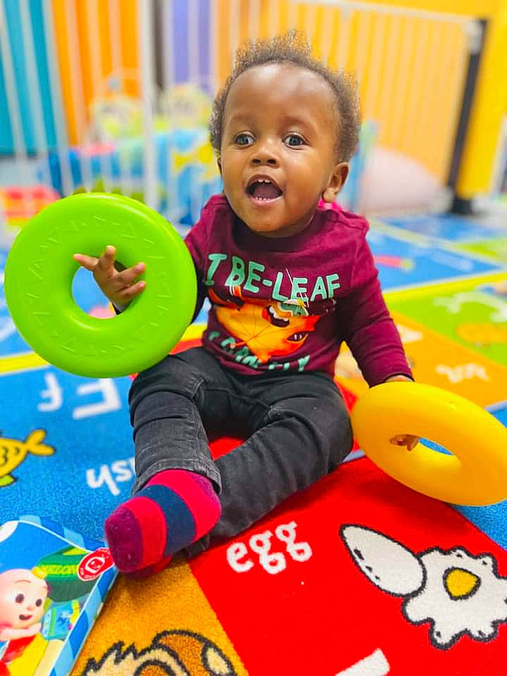 Louis joined the competition — help win amazing prizes! baby, baby_playing_with_toys, baby_toddler_clothing, baby_toys, carmine, child, circle, facial_expression, flooring, fun, happy, leisure, person, play, room, sitting, smile, snapshot, toddler, toy