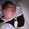 Alexander is registered to the contest to win money with this photo: baby, sleeping, pacifier, mitten, blanket, cushion, face, infant, cozy, resting, child, soft, comfort, indoors, closeup, cute, peaceful, clothing, head, portrait