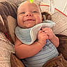 Levi joined the competition — help win amazing prizes! baby, smile, bib, infant, seat, cushion, pattern, clothing, happy, hand, face, indoor, toy, closeup, child, cute, expression, comfort, fabric, babygear