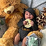 Andrew joined the competition — help win amazing prizes! baby, infant, plush_toy, teddy_bear, giraffe, dinosaur, milestone_card, hoodie, smile, socks, cute, soft_texture, baby_clothing, lying_down, cozy, child, toy, portrait, indoors, happy