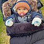 Nolann a rejoint le concours — aidez-le/la à gagner de superbes lots ! baby, beanie, blanket, child, cozy, cute, face, fur_trim, grass, jacket, mittens, outdoor, pacifier, path, person, portrait, stroller, warm, winter, winter_clothing