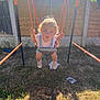 Kyra joined the competition — help win amazing prizes! toddler, child, swing, swing_set, outdoor, backyard, sunlight, grass, fence, curly_hair, summer, play, fun, happy, holding, rope, feet, shoes, clothing, nature
