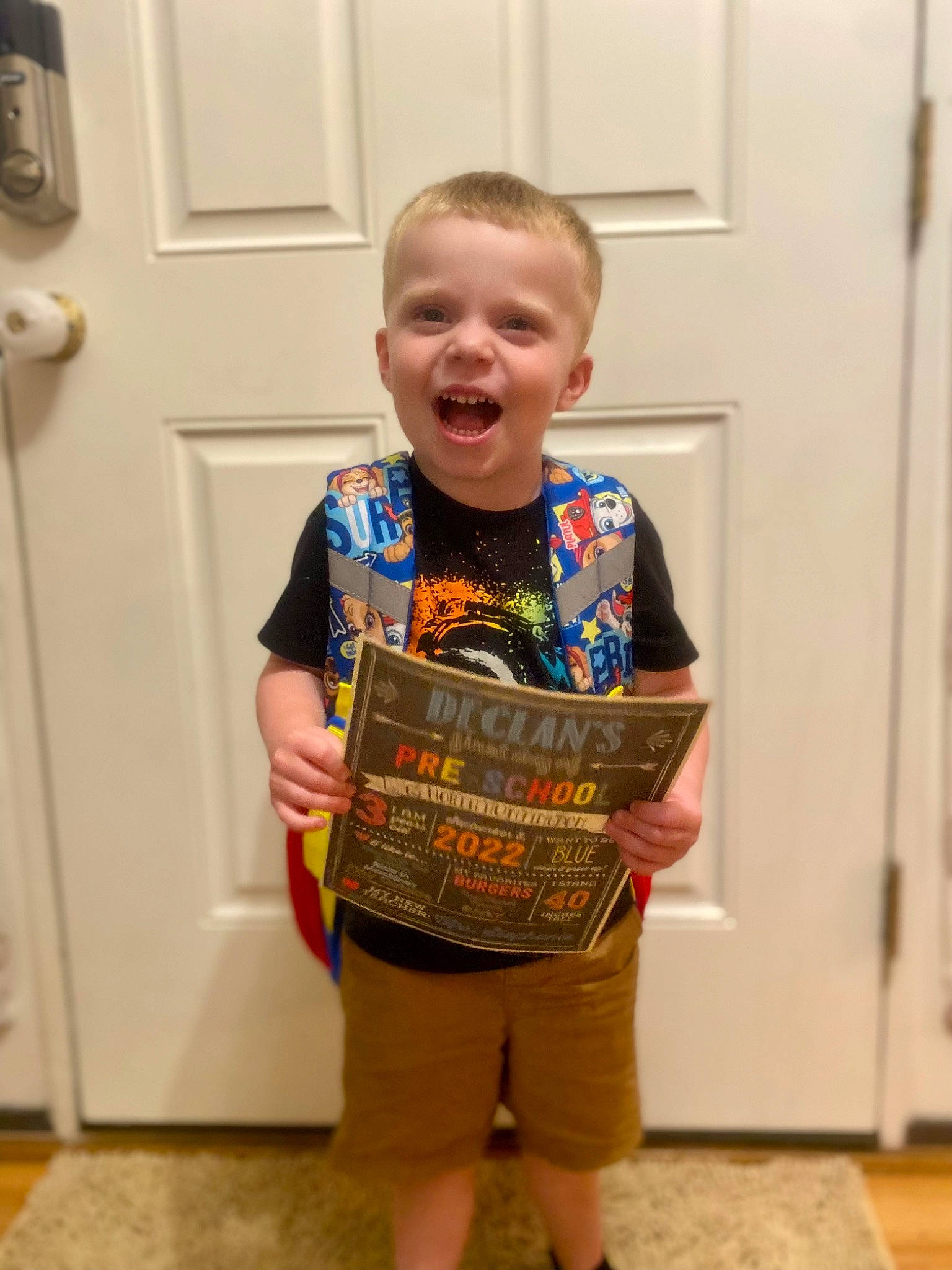 Declan is registered to the contest to win money with this photo: baby, baby_toddler_clothing, child, costume, door, electric_blue, event, flooring, fun, happy, hardwood, pattern, person, play, room, sleeve, smile, t_shirt, toddler, varnish