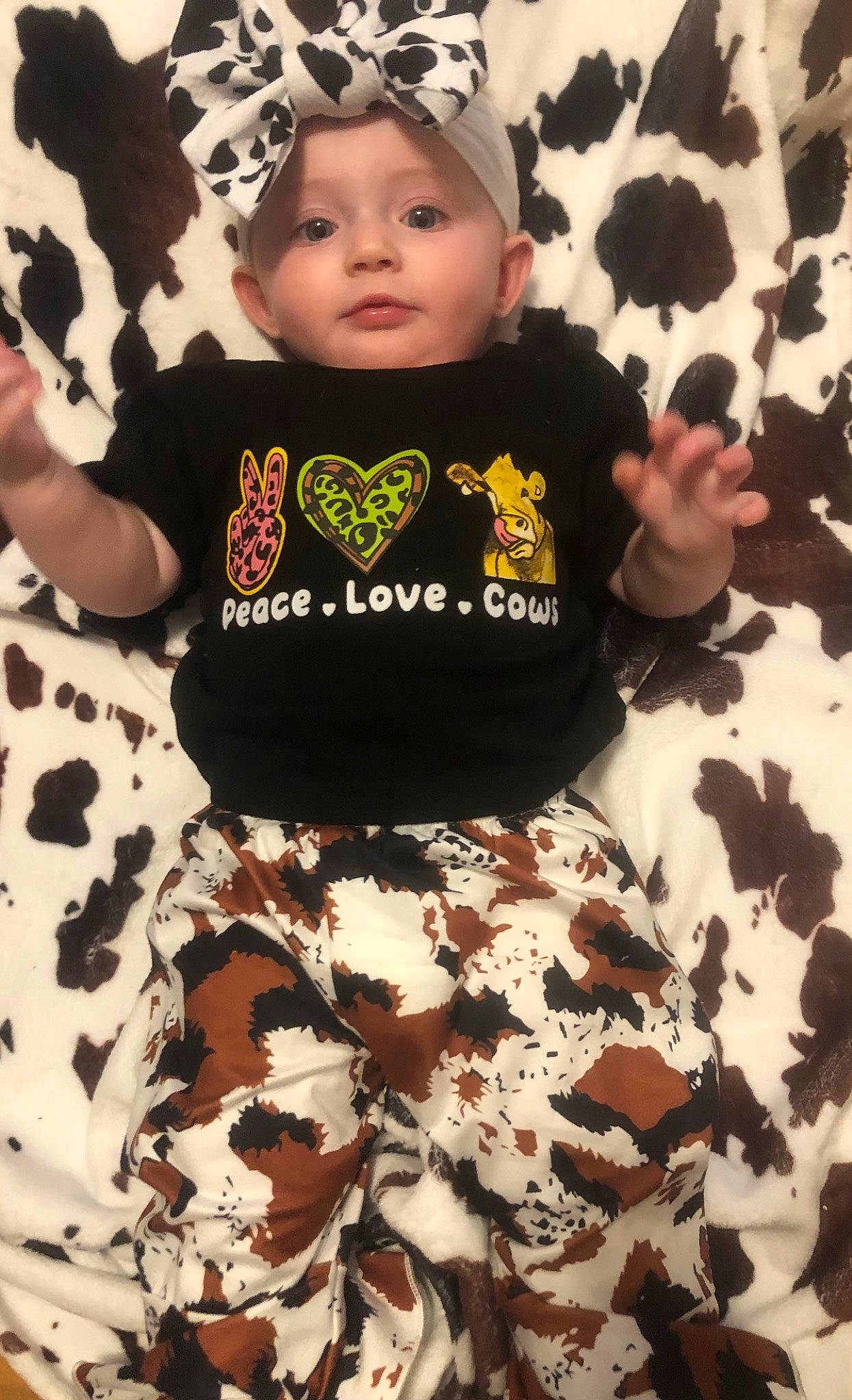 Gracelyn joined the competition — help win amazing prizes! baby, baby_toddler_clothing, beauty, camouflage, cap, child, eye, face, fashion_accessory, fashion_design, fur, happy, headwear, linens, military_camouflage, outerwear, pattern, person, sleeve, t_shirt