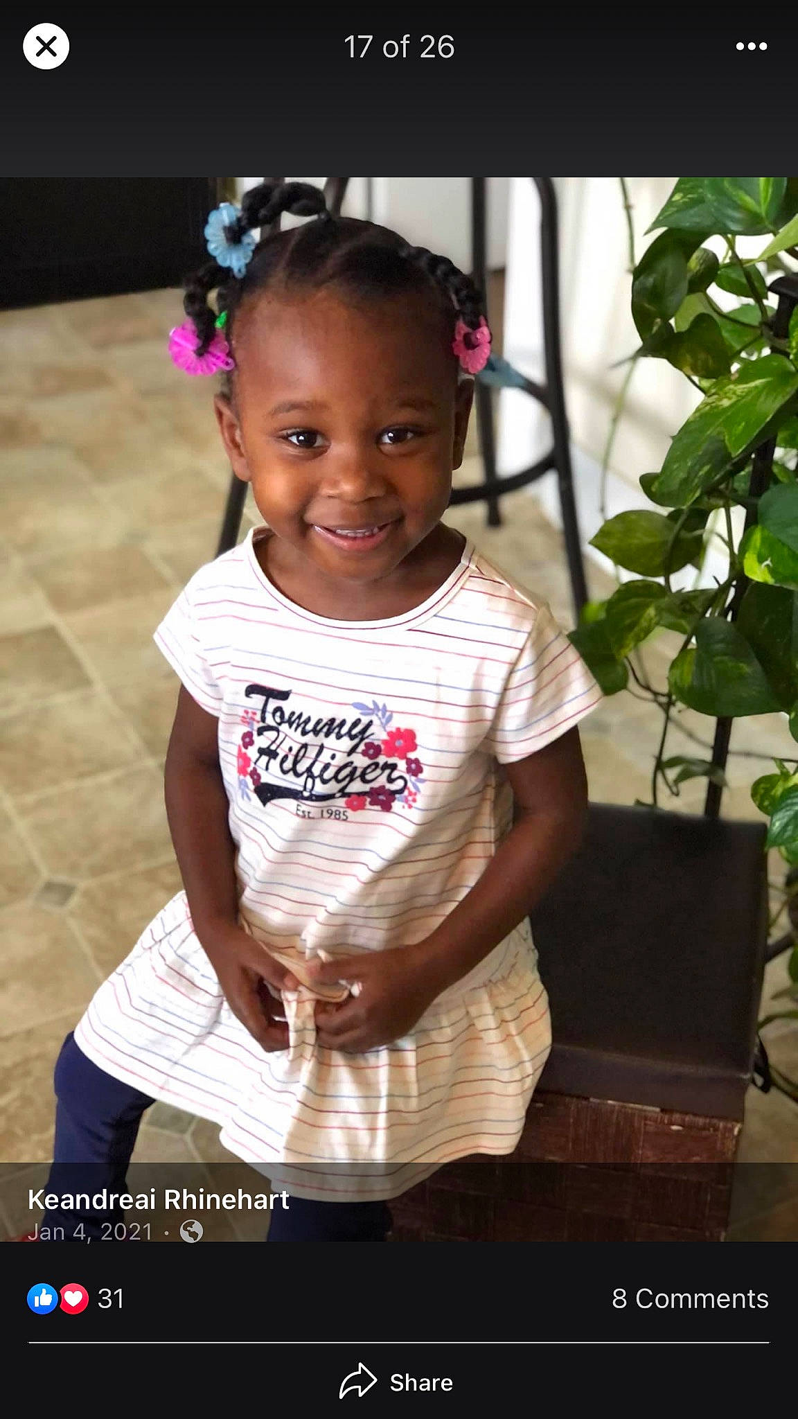 Kaylee is registered to the contest to win money with this photo: child, clothing, flash_photography, flowerpot, fun, happy, headband, houseplant, jewellery, joy, leisure, magenta, person, photo_caption, plant, portrait_photography, sitting, skin, sleeve, smile