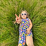 accessories, bodypart, child, face, female, field, girl, glasses, grass, grassland, head, nature, outdoors, person, photography, plant, portrait, sitting, summer, sunglasses