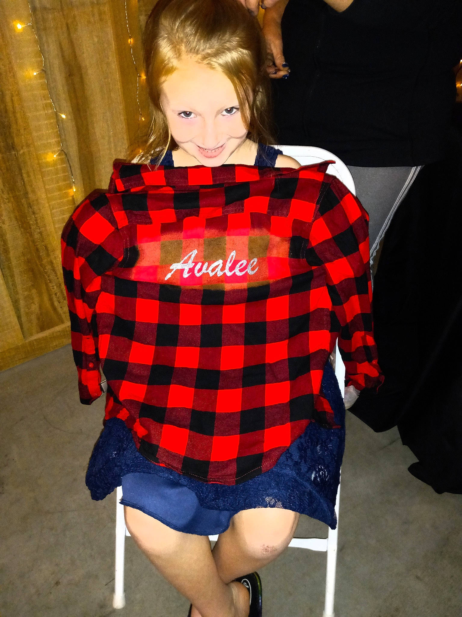 Avalee is registered to the contest to win money with this photo: collar, costume, electric_blue, event, fashion_accessory, fashion_design, fun, hairstyle, human_leg, joy, knee, orange, pattern, person, plaid, sleeve, smile, sportswear, t_shirt, tartan