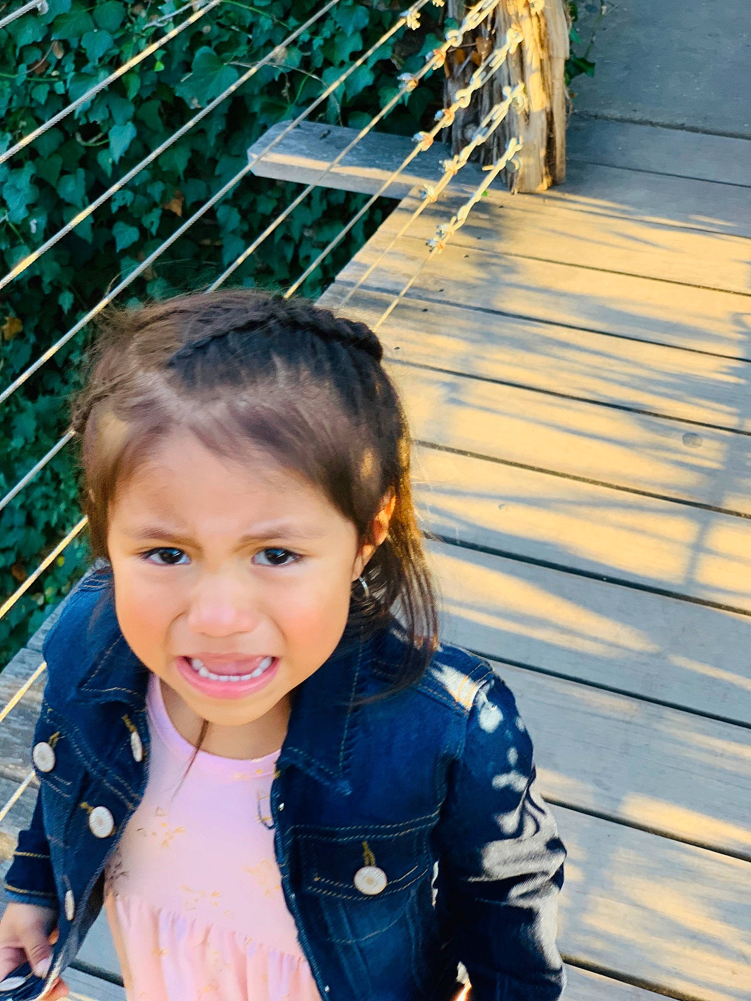 Tatiana is registered to the contest to win money with this photo: beauty, black_hair, blue, child, electric_blue, fence, fun, grass, happy, iris, leisure, people_in_nature, person, recreation, sitting, skin, smile, street_fashion, toddler, travel