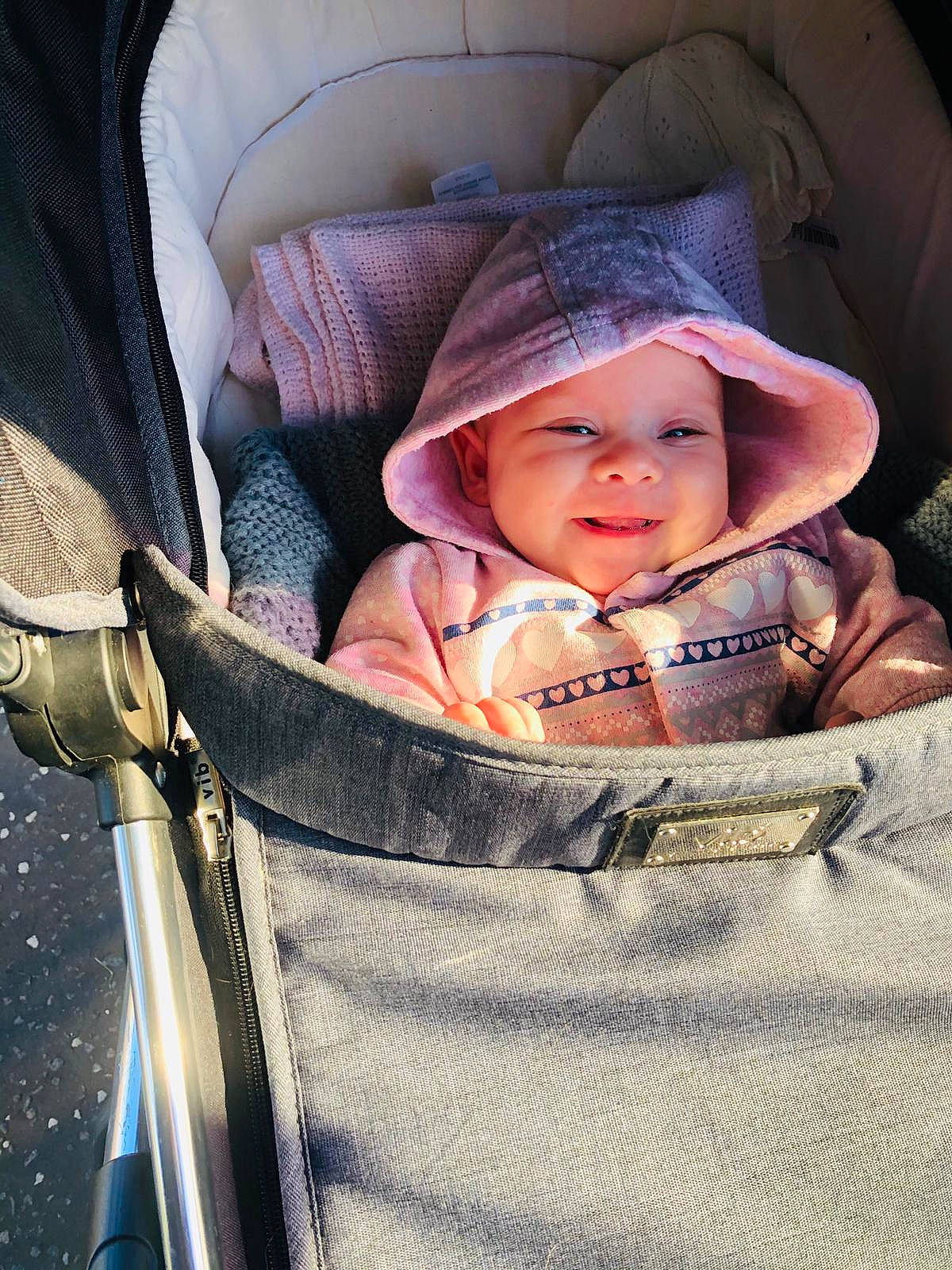 Olivia joined the competition — help win amazing prizes! auto_part, baby, baby_carriage, baby_products, baby_safety, baby_toddler_clothing, brown, cap, car_seat, cheek, child, comfort, fashion_accessory, hat, headwear, infant_bed, iris, person, product, sitting