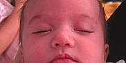 Maël participe au concours pour gagner de l'argent avec cette photo : baby, sleeping, close_up, blanket, soft_lighting, peaceful, infant, face, cozy, rest, child, portrait, indoors, cute, young, calm, skin, eyelids_closed, head, comfort