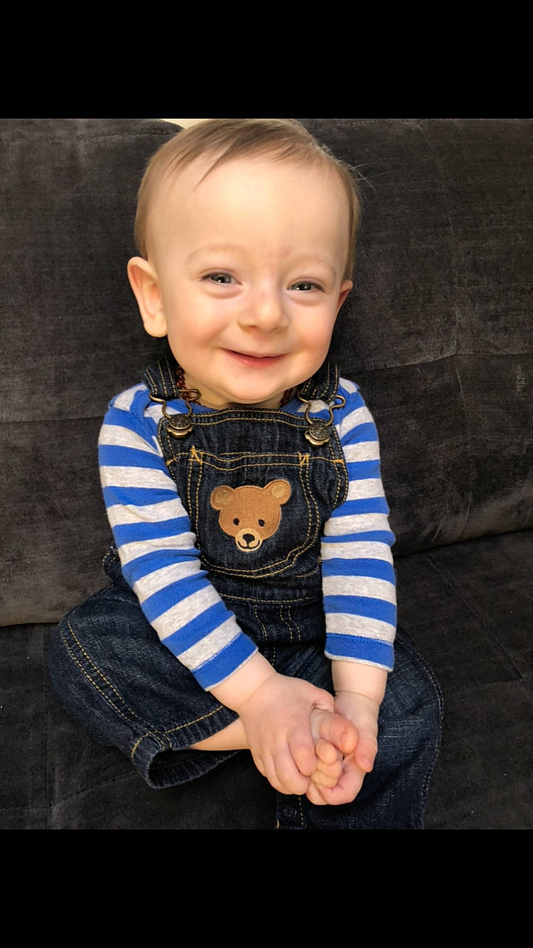 Alexei is registered to the contest to win money with this photo: baby, baby_toddler_clothing, cheek, child, child_model, face, head, joy, pattern, person, photography, plaid, portrait, portrait_photography, sitting, smile, toddler