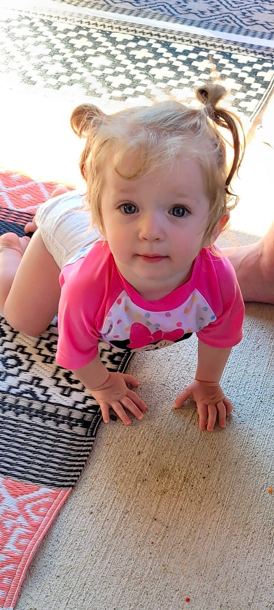 Everleigh joined the competition — help win amazing prizes! baby, baby_toddler_clothing, cheek, eye, floor, flooring, grass, hair, hairstyle, happy, head, iris, lip, mouth, nose, person, pink, skin, sleeve, toddler