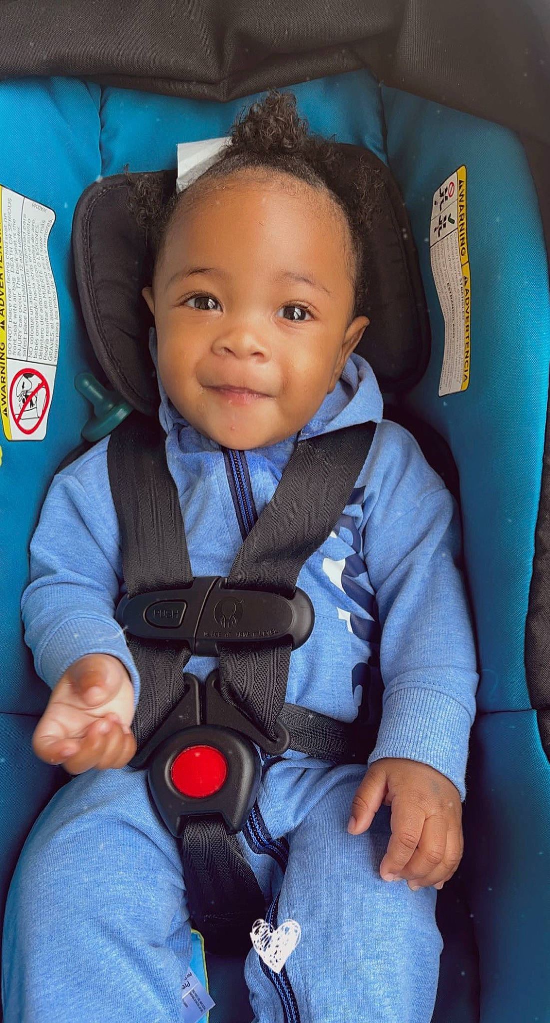 Jonathon is registered to the contest to win money with this photo: baby, baby_in_car_seat, baby_toddler_clothing, car_seat, cheek, child, comfort, electric_blue, finger, happy, head, joy, nose, person, product, seat_belt, skin, sleeve, smile, thumb