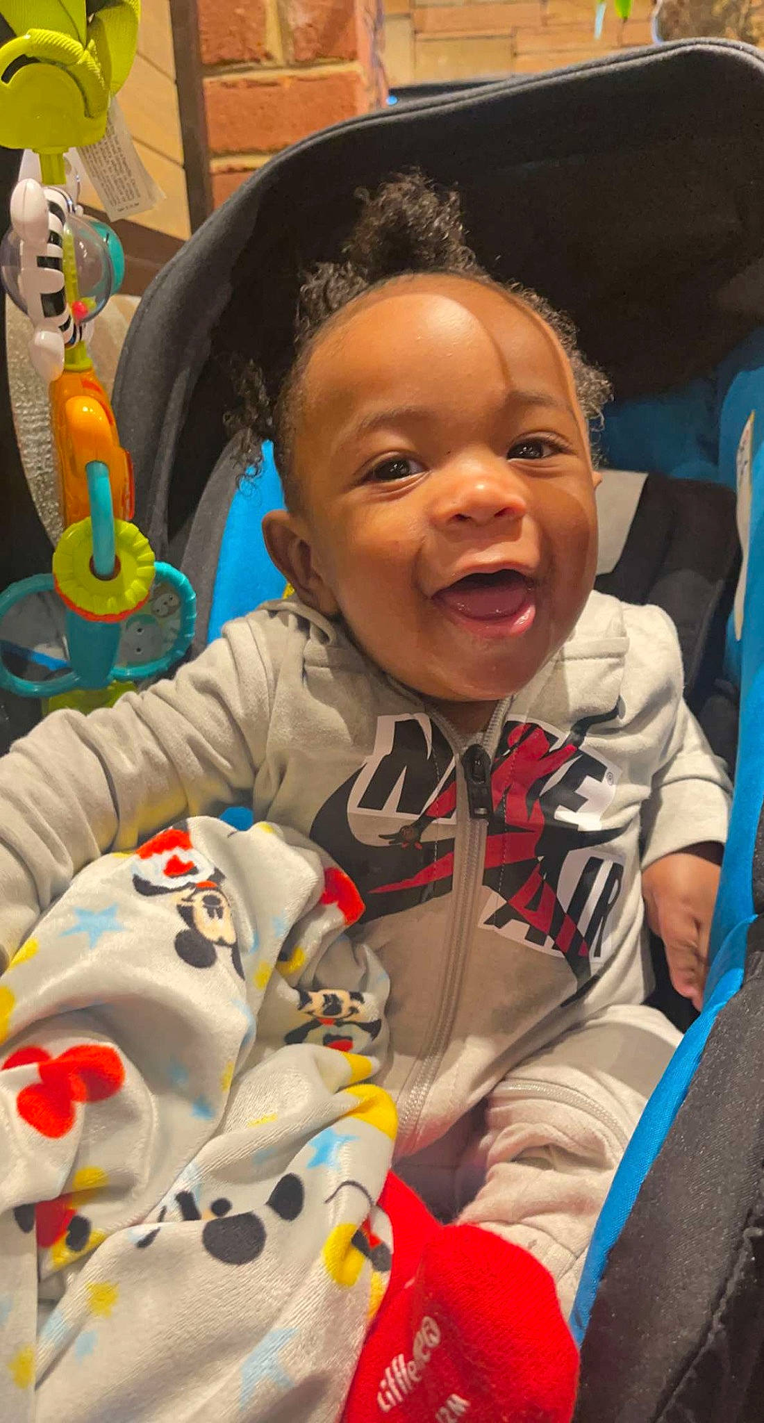 Jonathon is registered to the contest to win money with this photo: baby, baby_products, baby_toddler_clothing, cheek, child, comfort, event, facial_expression, fun, happy, leisure, mouth, nose, people, person, product, sitting, skin, smile, toddler