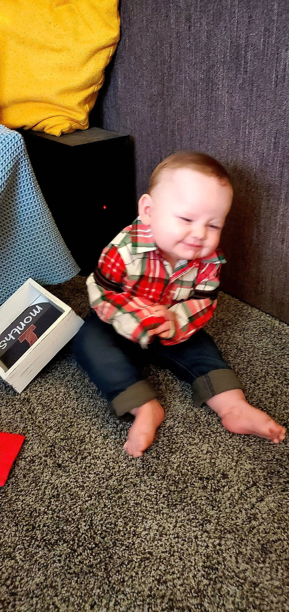 Lee joined the competition — help win amazing prizes! baby, baby_toddler_clothing, child, comfort, finger, floor, flooring, fun, human_body, knee, lap, leg, pattern, person, plaid, sitting, sleeve, sock, t_shirt, toddler