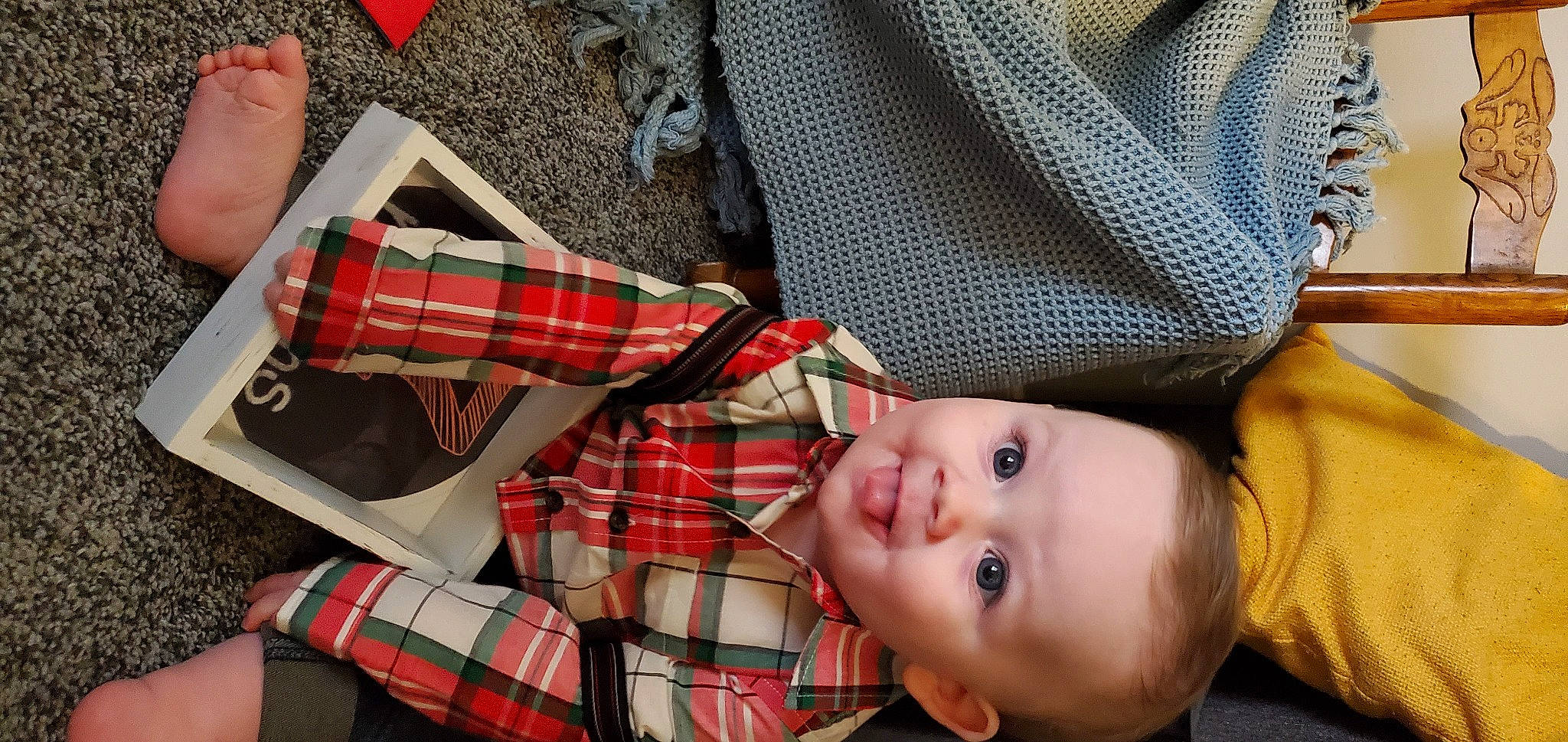 Lee is registered to the contest to win money with this photo: baby, baby_toddler_clothing, button, carmine, child, collar, dress_shirt, eyewear, fashion_accessory, happy, pattern, person, plaid, red, sleeve, smile, sock, tartan, textile, toddler