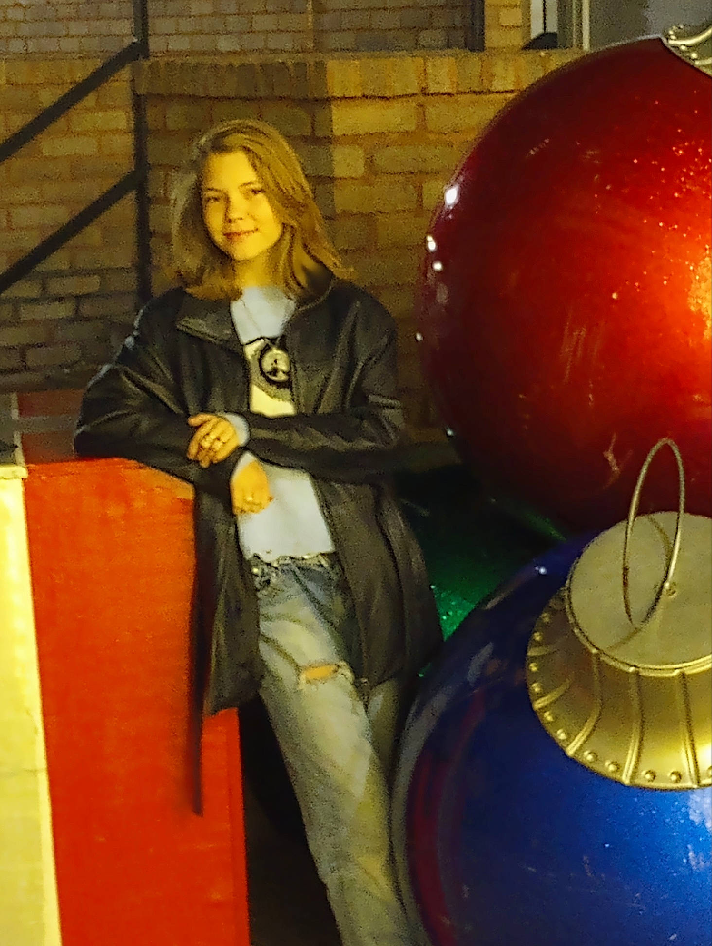 Ivy is registered to the contest to win money with this photo: art, ball, balloon, circle, drawing, event, fun, gas, illustration, jacket, joy, metal, paint, painting, party_supply, person, sculpture, sitting, space, sphere