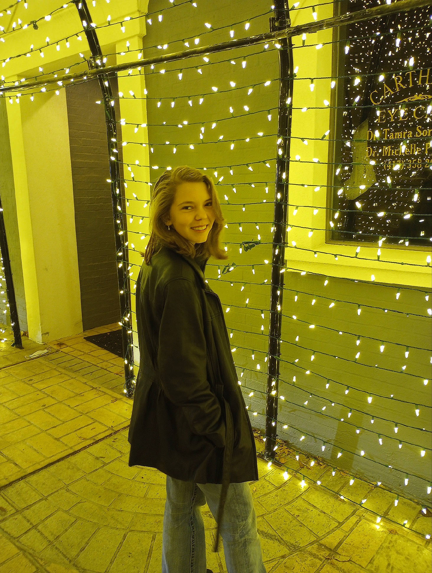 Ivy joined the competition — help win amazing prizes! city, darkness, electric_blue, flooring, fun, glass, joy, lighting, line, night, pattern, person, reflection, road_surface, shadow, smile, standing, street, tints_and_shades, tree