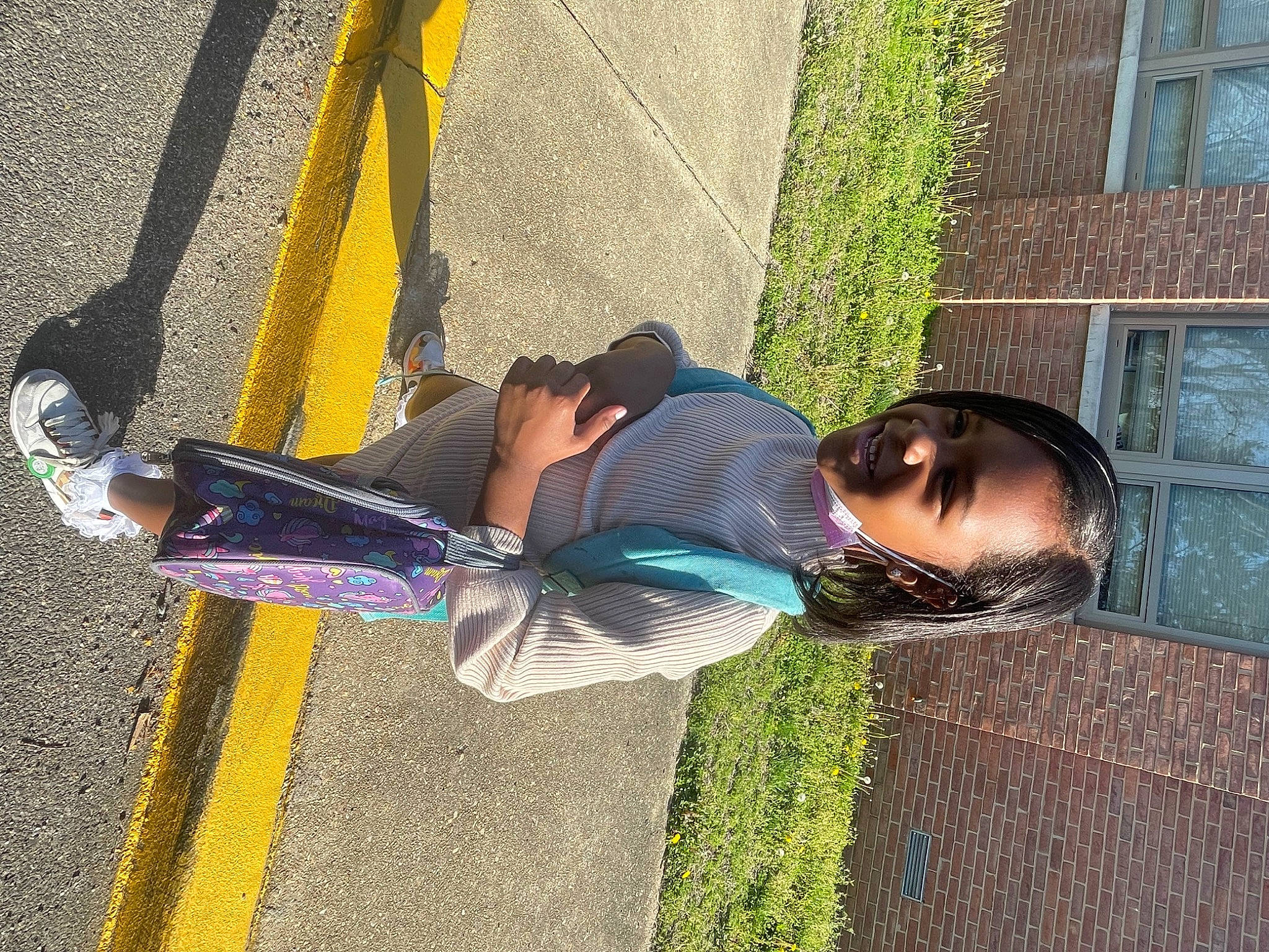 Paige joined the competition — help win amazing prizes! asphalt, city, electric_blue, eyewear, fun, grass, human_leg, joy, leisure, pedestrian, person, plant, road_surface, shadow, sidewalk, sitting, street, street_fashion, sunglasses, tints_and_shades