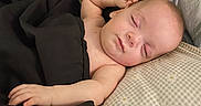 Memphis joined the competition — help win amazing prizes! baby, sleeping, blanket, pillow, infant, peaceful, resting, face, skin, hand, closed_eyes, indoors, young_child, cute, cozy, portrait, head, peace, calm, child