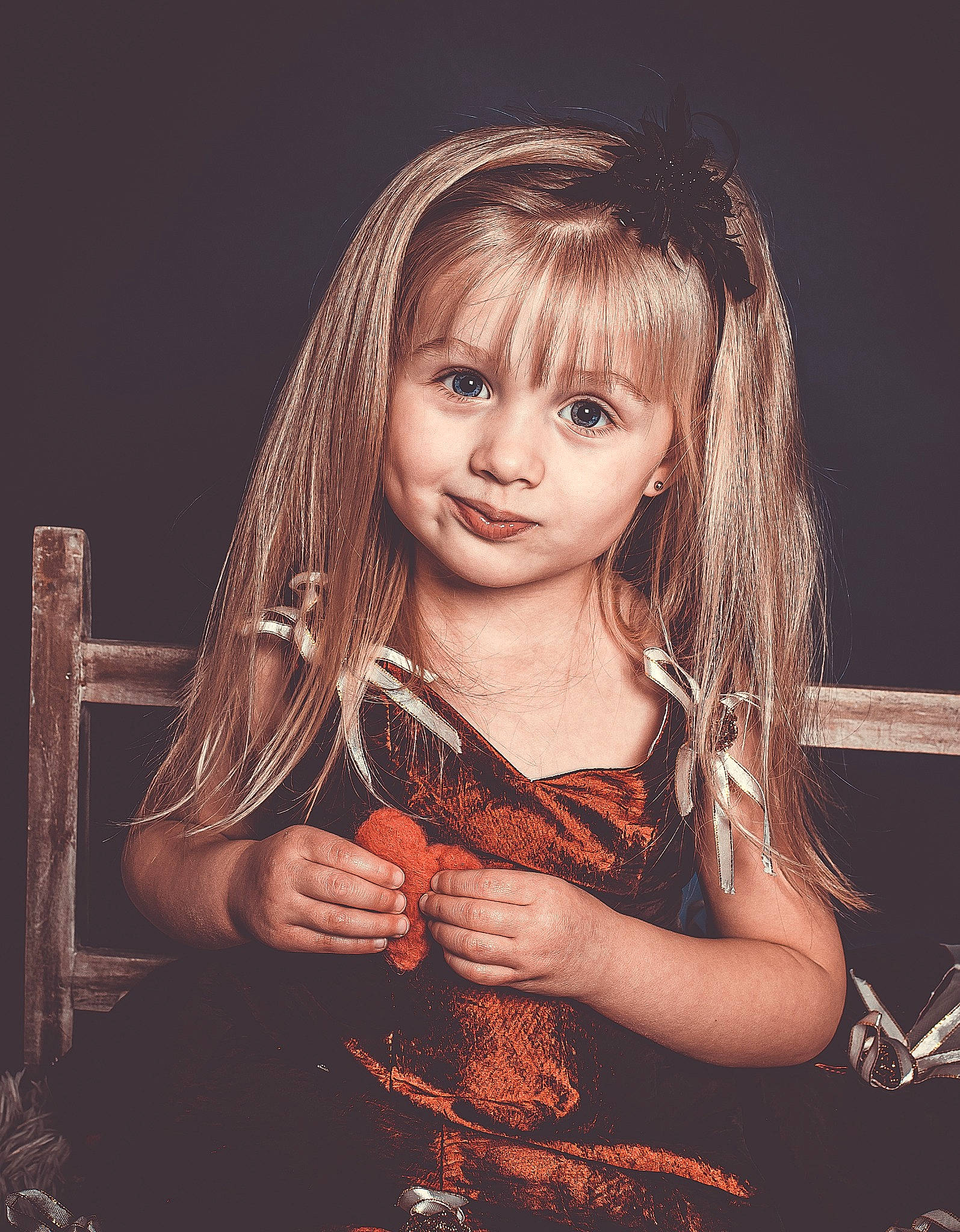 Roxane participe au concours pour gagner de l'argent avec cette photo : bangs, black_hair, brown_hair, child, chin, dress, eyelash, facial_expression, flash_photography, fun, gesture, happy, iris, layered_hair, lip, long_hair, person, skin, step_cutting, toddler