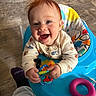 Liam joined the competition — help win amazing prizes! baby, infant, smiling, happy, red_hair, baby_walker, toy, indoor, floor, clothing, sitting, child, person, playful, colorful, cute, small_hands, foot, sock, joyful
