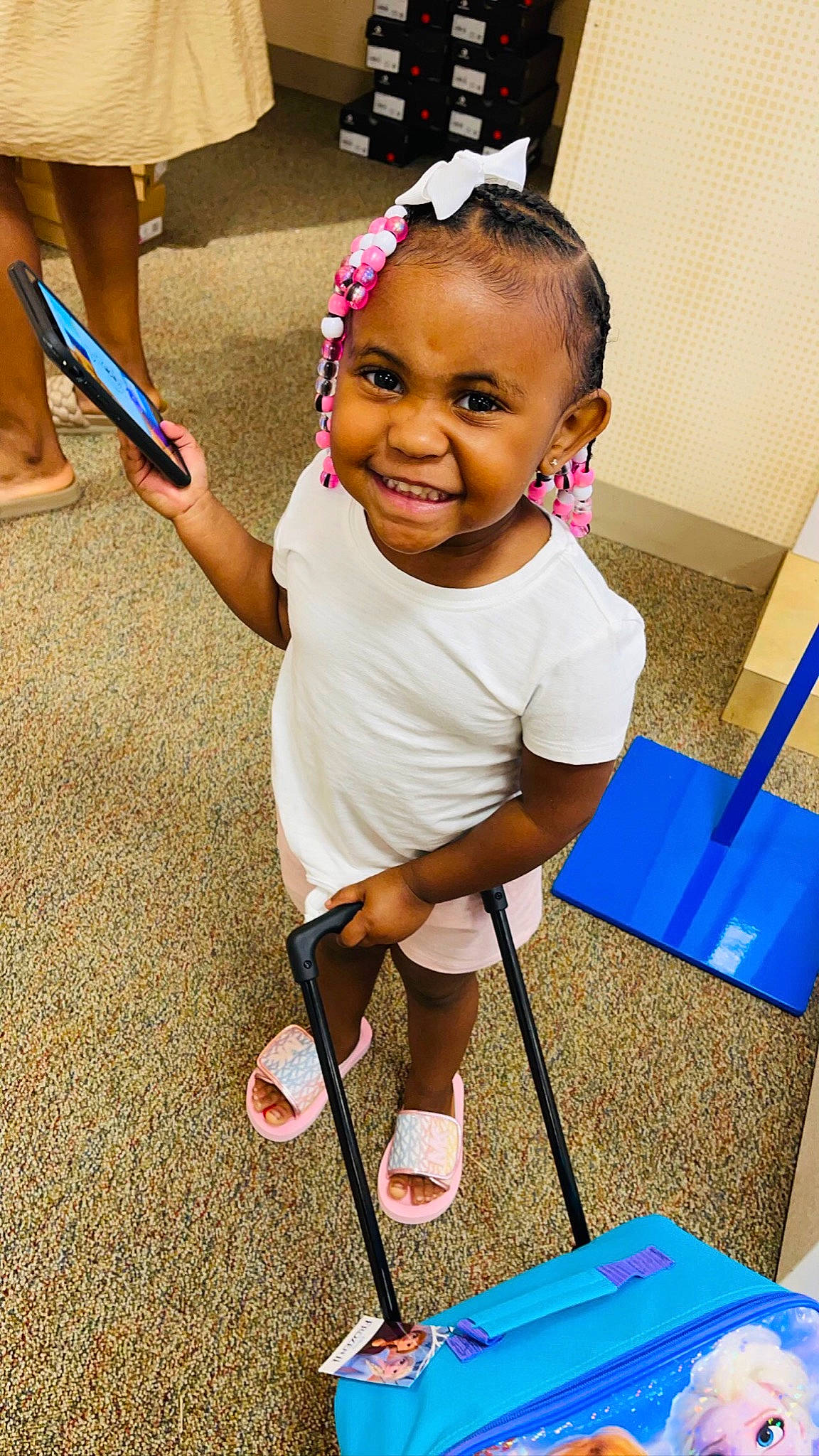 Kaisley is registered to the contest to win money with this photo: baby, baby_toddler_clothing, blue, child, cleanliness, flooring, fun, golf_equipment, happy, headband, human_leg, joy, knee, person, photograph, play, product, smile, snapshot, standing