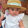 baby, brick_wall, child, cute, dress, earrings, expression, face, fashion, floral_embroidery, hat, innocence, outdoor, person, portrait, sidewalk, straw_hat, summer, toddler, white_dress
