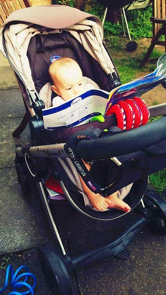 Briana joined the competition — help win amazing prizes! baby_carriage, baby_products, car_seat, chair, child, furniture, person, plant, product, vehicle