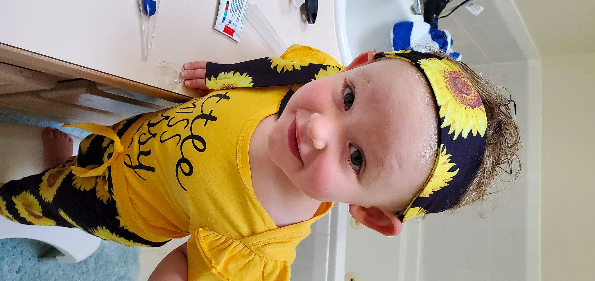 Sail is registered to the contest to win money with this photo: cheek, child, headgear, headwear, joy, mouth, nose, person, toddler, yellow