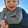 Tate joined the competition — help win amazing prizes! blue_eyes, casual, child, closeup, clothing, cute, gray_sweater, hand, happy, holding, joy, outdoor, person, portrait, sky, smiling, sunlight, tattoo, toddler, young_child