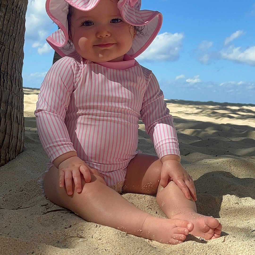 Anastasia joined the competition — help win amazing prizes! baby, beach, beachwear, clothing, coast, face, hat, head, nature, outdoors, person, photography, plant, portrait, sea, shoreline, summer, sunhat, tree, water