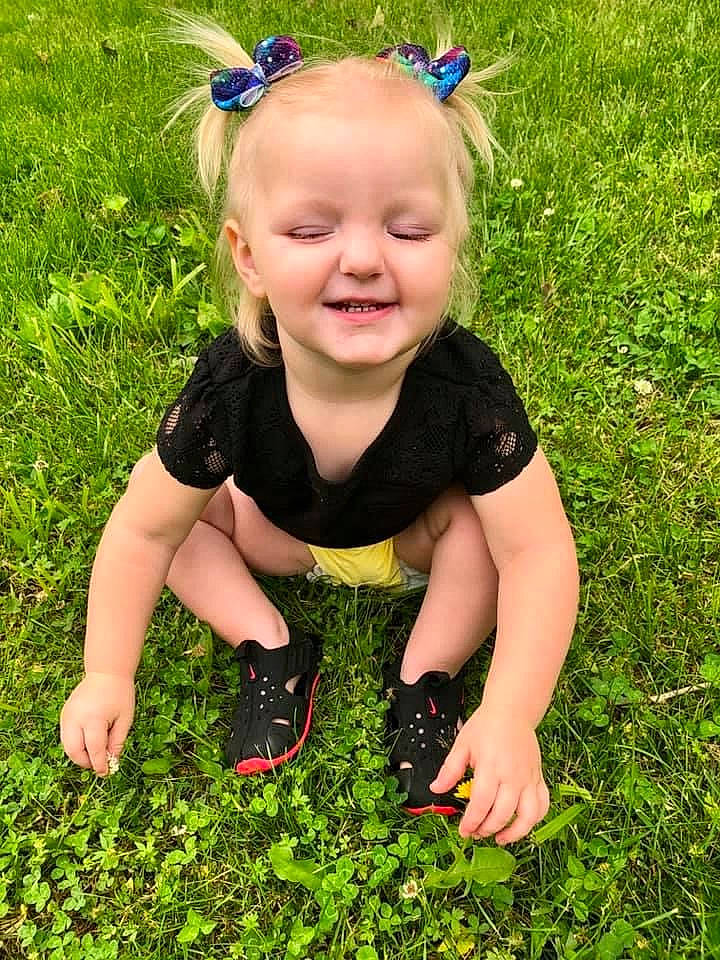Britlyn is registered to the contest to win money with this photo: baby, baby_toddler_clothing, blue, botany, finger, fun, grass, grass_family, grassland, green, groundcover, happy, joy, leaf, meadow, people_in_nature, person, plant, smile, summer