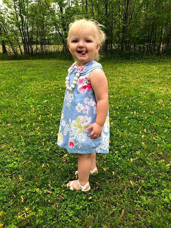 Britlyn joined the competition — help win amazing prizes! baby_toddler_clothing, child, day_dress, facial_expression, grass, grass_family, hair, hairstyle, happy, joy, leaf, meadow, one_piece_garment, people_in_nature, person, plant, sleeve, smile, summer, sunlight