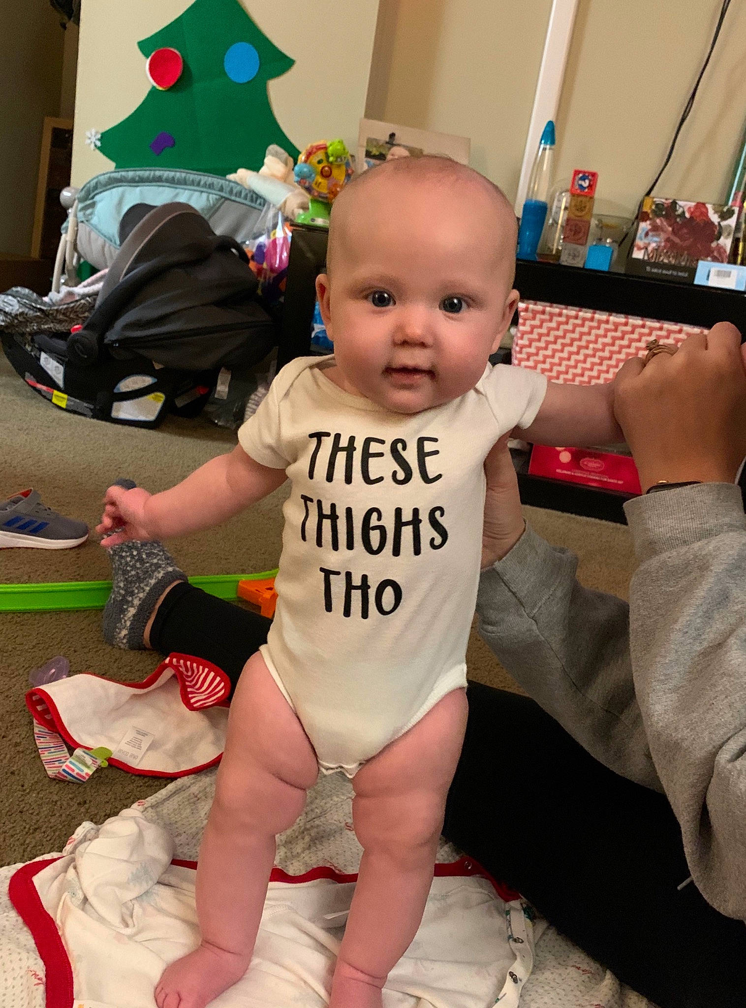 Lilah is registered to the contest to win money with this photo: baby, baby_toddler_clothing, child, finger, leg, person, play, toddler