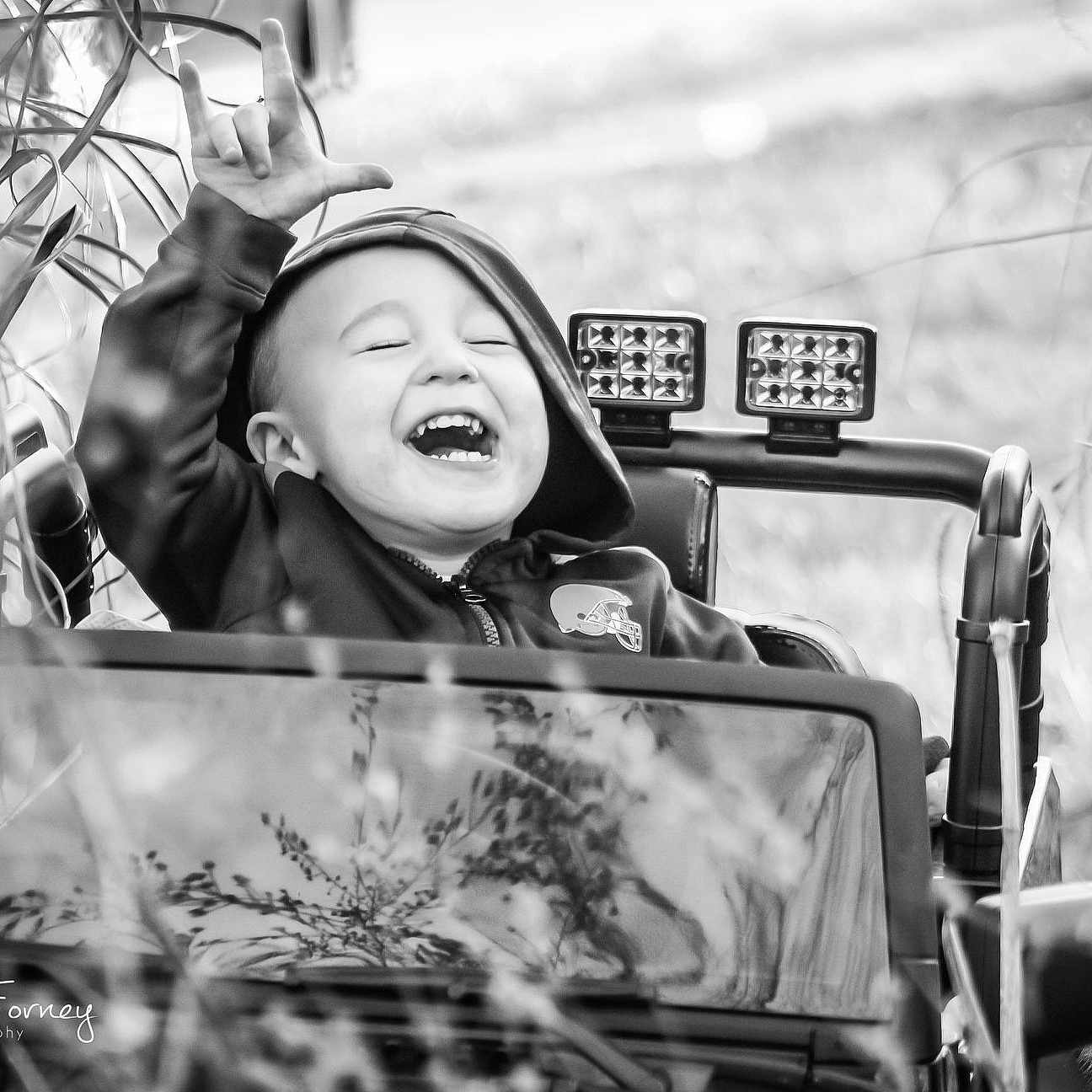 Lincoln is registered to the contest to win money with this photo: beauty, black_and_white, car, facial_expression, happy, human, mode_of_transport, monochrome, monochrome_photography, people, photograph, photography, plant, portrait_photography, smile, snapshot, street, style, tree, vehicle