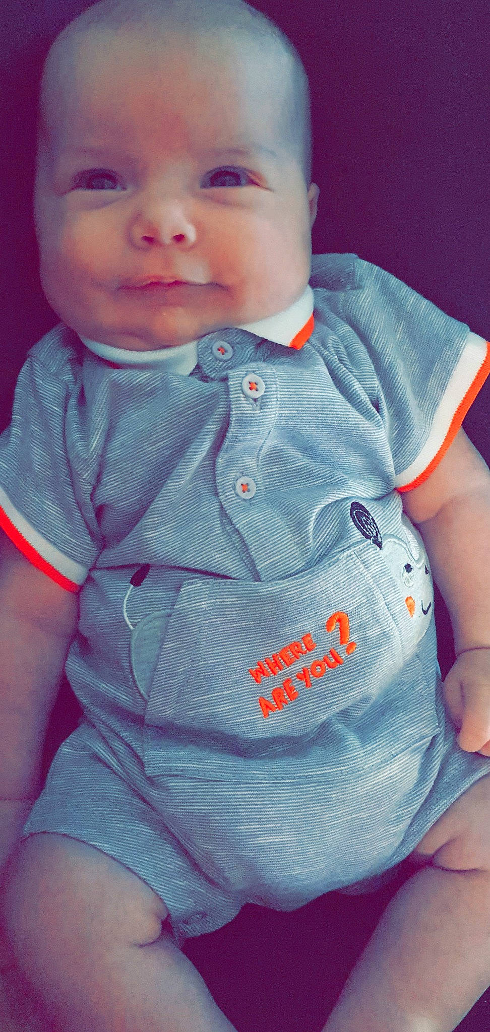 Pablo participe au concours pour gagner de l'argent avec cette photo : arm, baby, baby_products, baby_toddler_clothing, cheek, child, chin, lip, nose, person, pink, product, skin, sleeve, smile, t_shirt, toddler