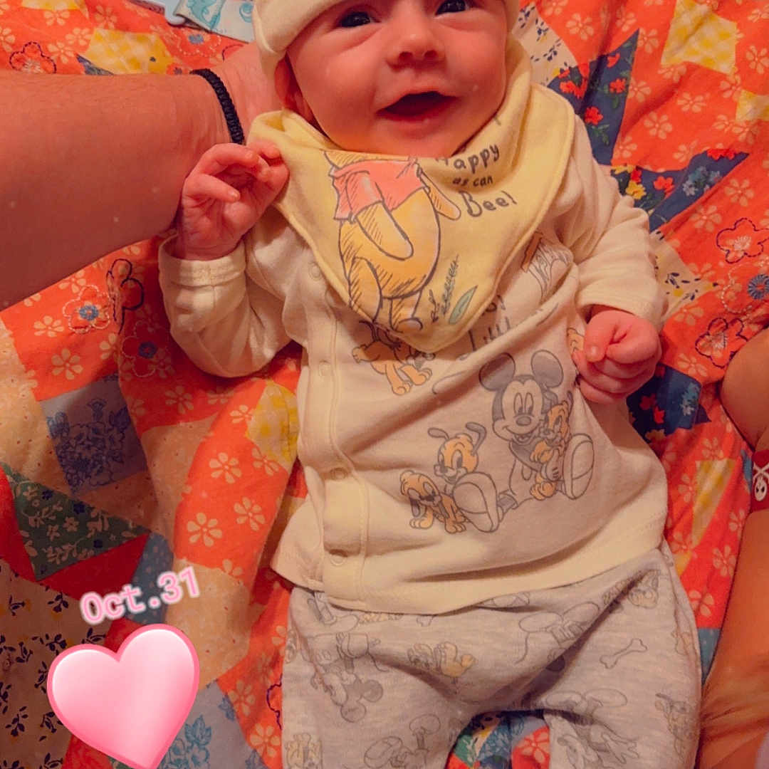 Ryker Lee joined the competition — help win amazing prizes! baby, blanket, bodypart, bonnet, cap, clothing, couch, face, finger, furniture, hand, hat, head, newborn, pants, person, photography, portrait, quilt, toy