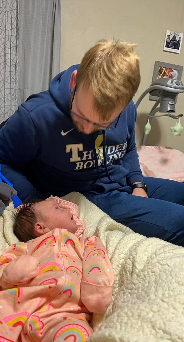 Lydia is registered to the contest to win money with this photo: abdomen, baby, chest, child, comfort, curtain, event, health_care, hospital, joint, medical, medical_procedure, muscle, patient, person, room, service, sitting, t_shirt, toddler