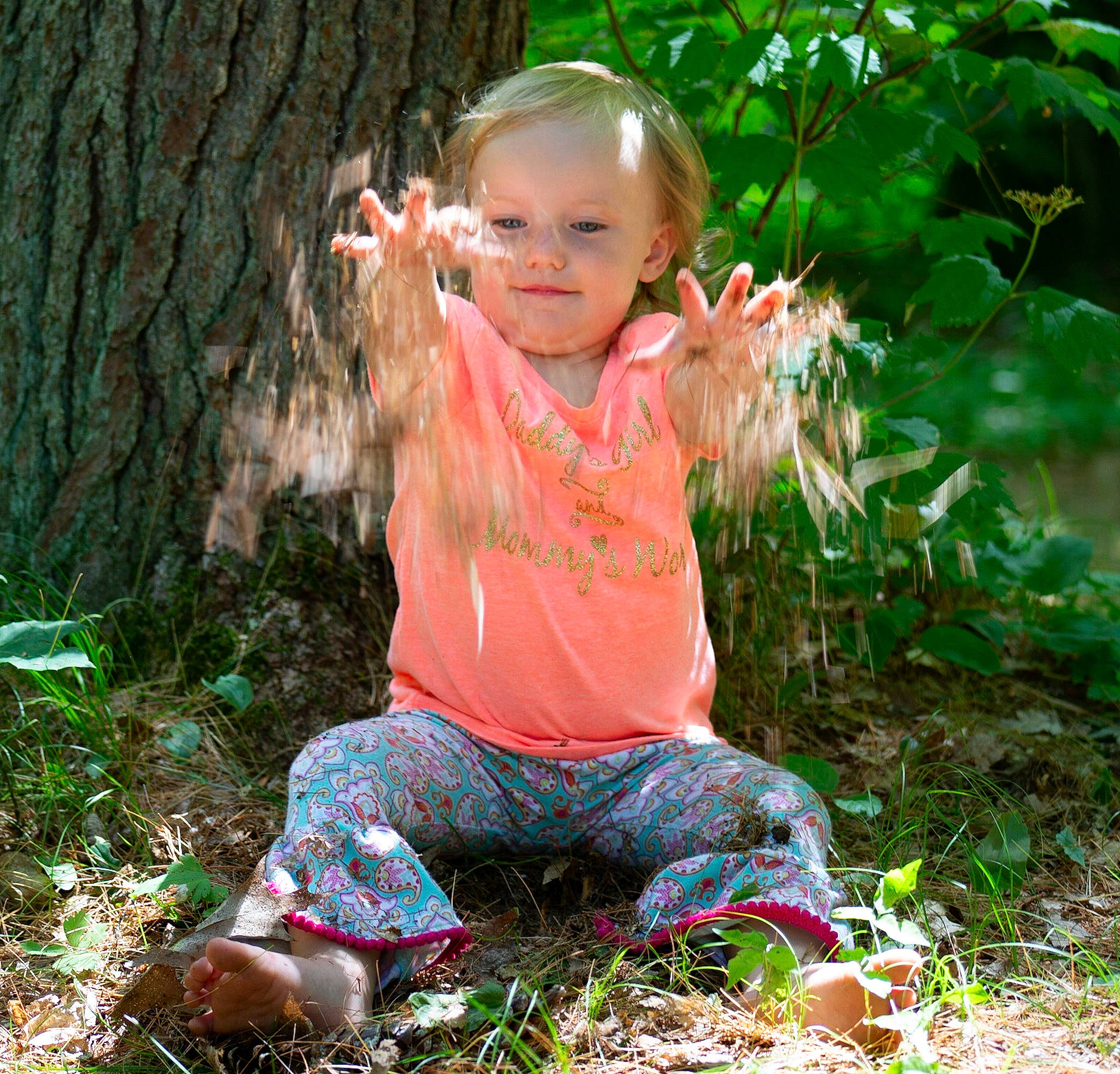 Maleah is registered to the contest to win money with this photo: adaptation, baby, child, child_model, grass, happy, leaf, people_in_nature, person, photography, plant, play, sitting, smile, spring, toddler, tree