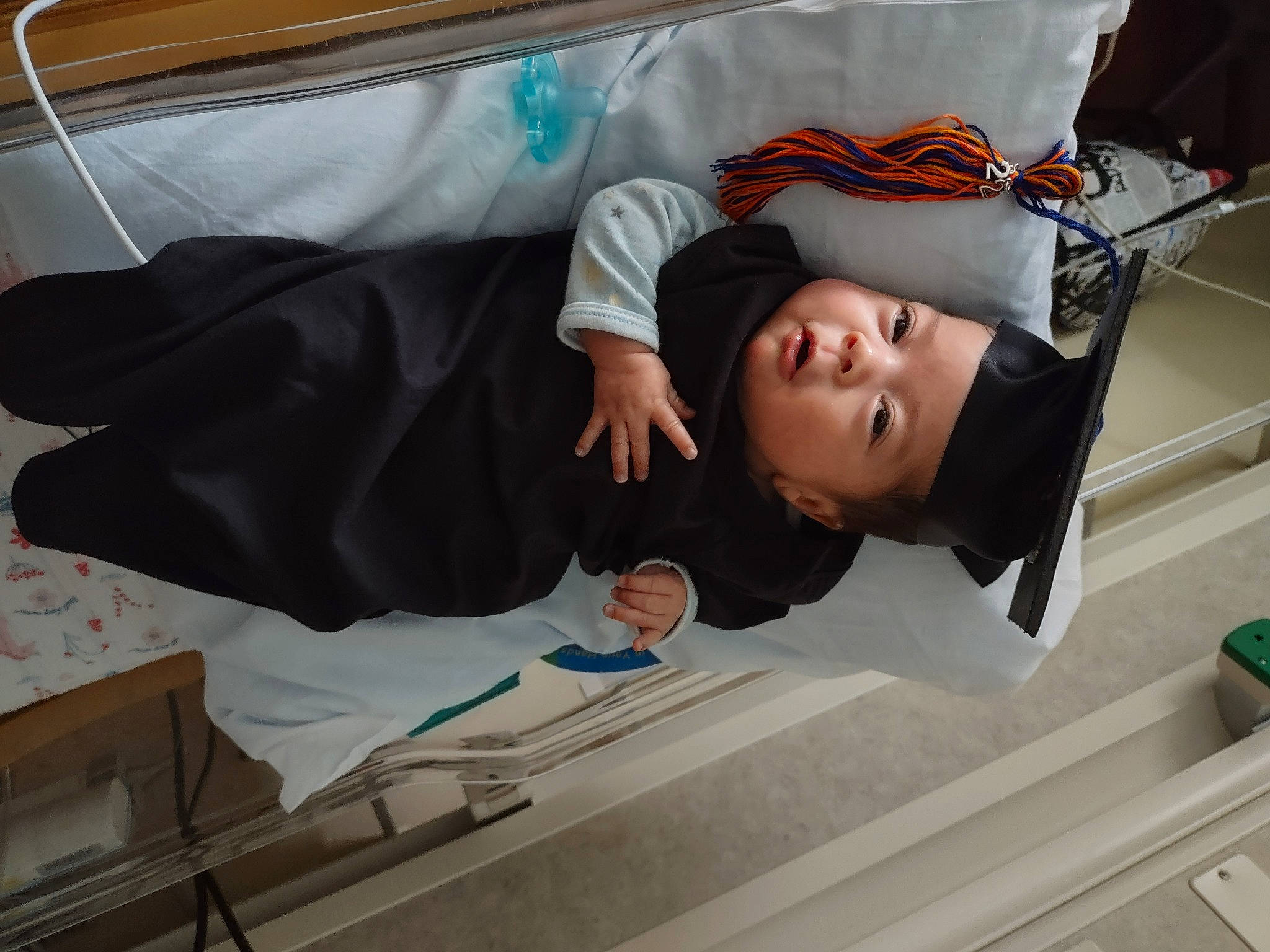 Mariana is registered to the contest to win money with this photo: baby, baby_products, baby_safety, bedding, child, comfort, headwear, hospital, linens, nap, person, room, service, toddler