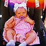 Isla joined the competition — help win amazing prizes! baby, infant, child, pacifier, car_seat, headband, bow, pink_outfit, floral_pattern, blanket, socks, seat_belt, safety_label, bead_chain, closeup, portrait, colorful_light, rainbow_filter, grumpy_expression, cute